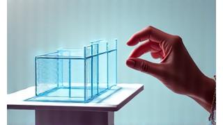 Hand making a gesture in mid-air in front of a virtual SketchUp model, signifying VR interaction.